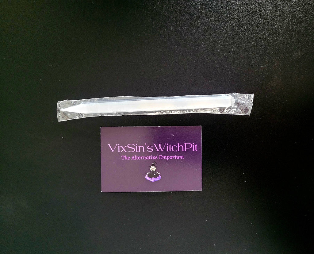 Clear crystal Selenite Wand on a black background with a purple card displaying 'VixSin's WitchPit' brand.