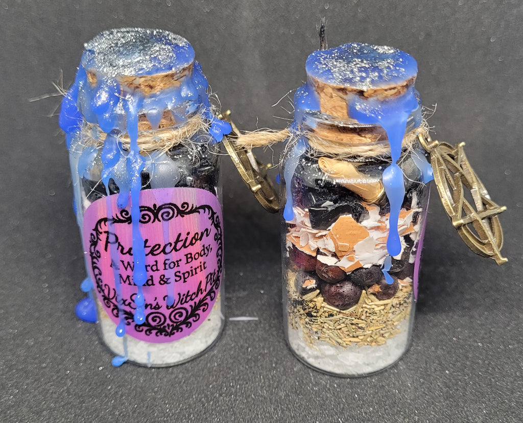 Two decorative bottles with cork lids on a dark background